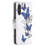 Калъф тип портмоне за Samsung Galaxy S21 FE - сини пеперуди - 0 Калъф тип портмоне за Samsung Galaxy S21 FE - сини пеперуди - 0